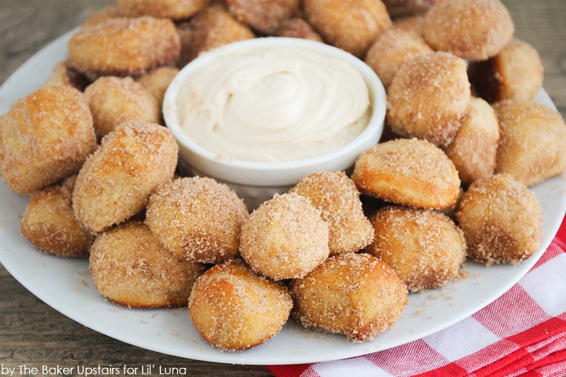 New Year's Eve Appetizers - several cinnamon sugar pretzel bites served with dipping sauce.