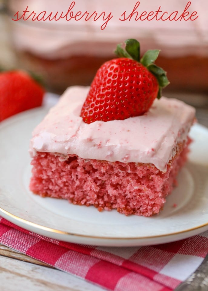 Strawberry Sheet Cake - one of the best desserts ever!! A moist and delicious strawberry cake topped with a strawberry cream cheese frosting!