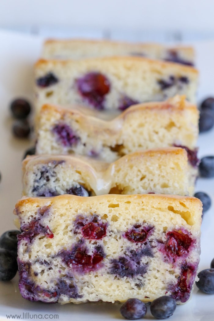 Zucchini bread - sliced blueberry quick bread on a cutting board.