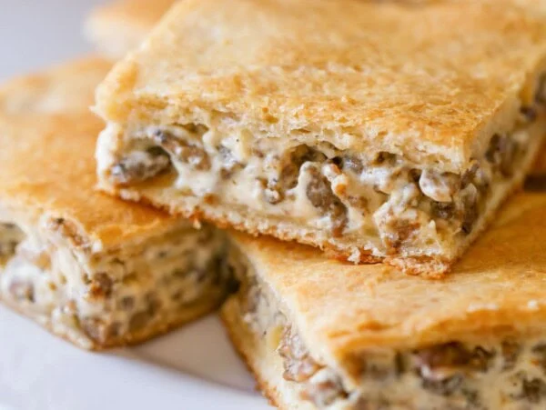 Slice of sausage cream cheese breakfast casserole.