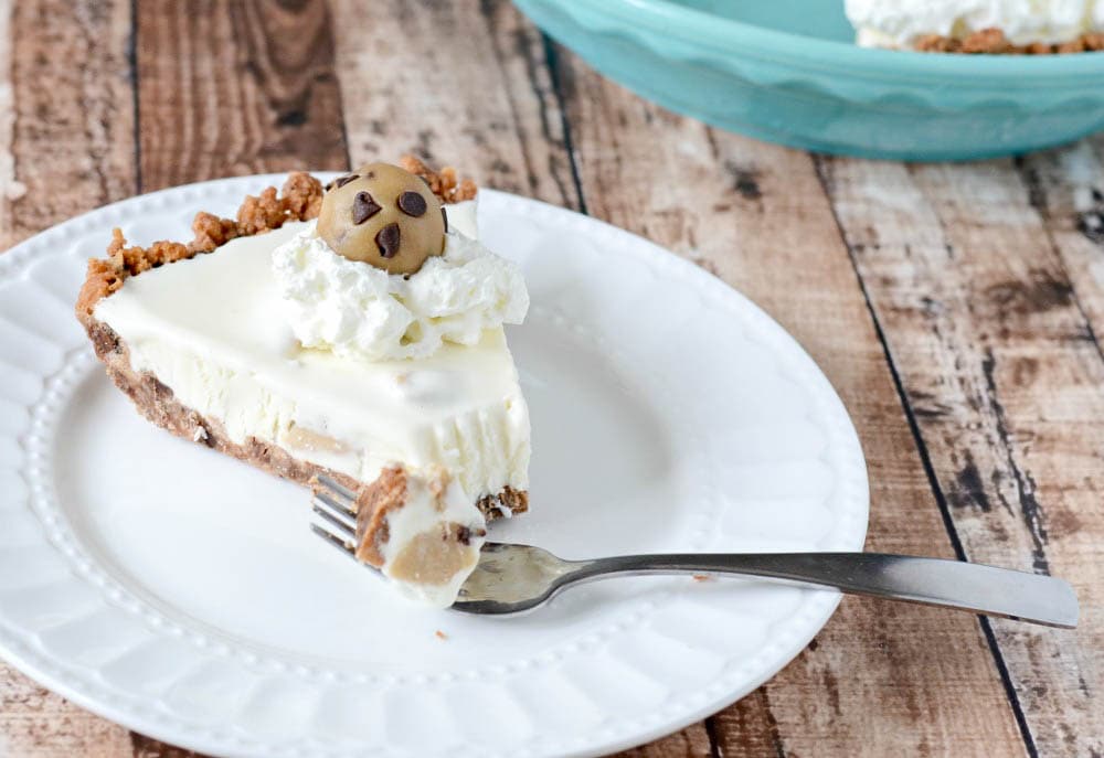 piece of frozen pie on a plate with a fork