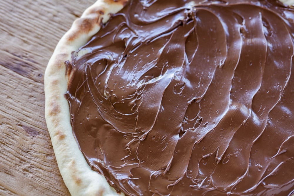 Nutella spread on pizza 