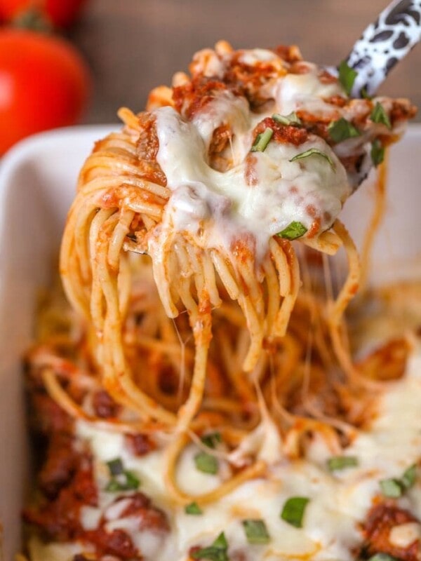 cheesy baked spaghetti in serving spoon