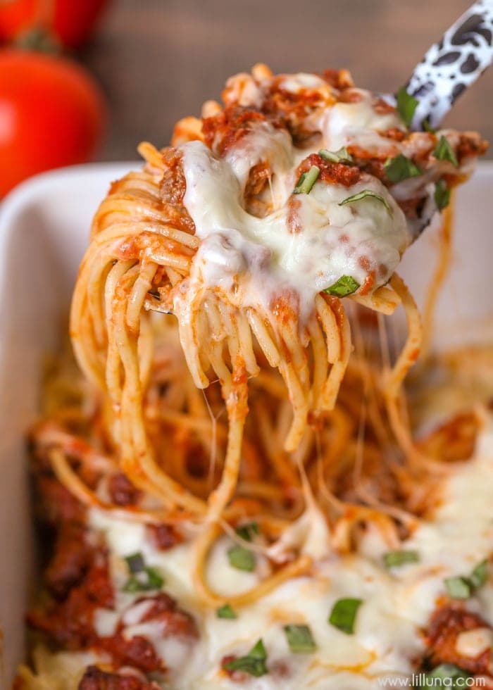 cheesy baked spaghetti in serving spoon