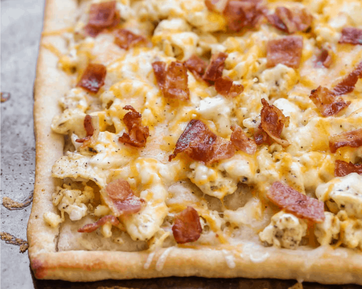 5 Ingredient Recipes - Close up of breakfast pizza topped with bacon.