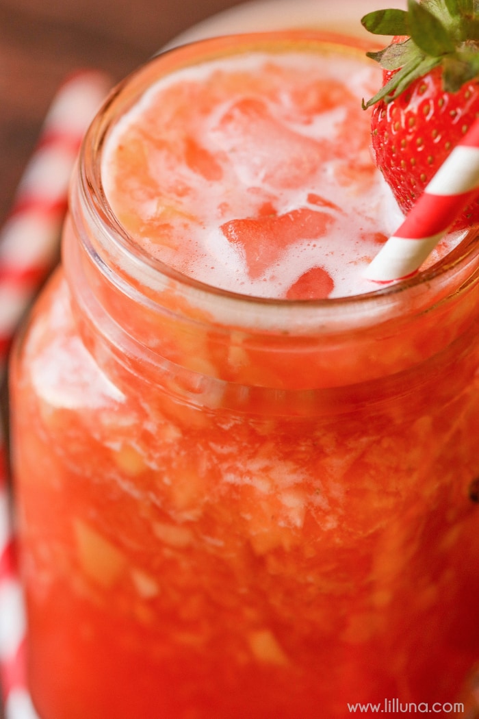 The BEST Strawberry Lemonade served cold in a glass mug