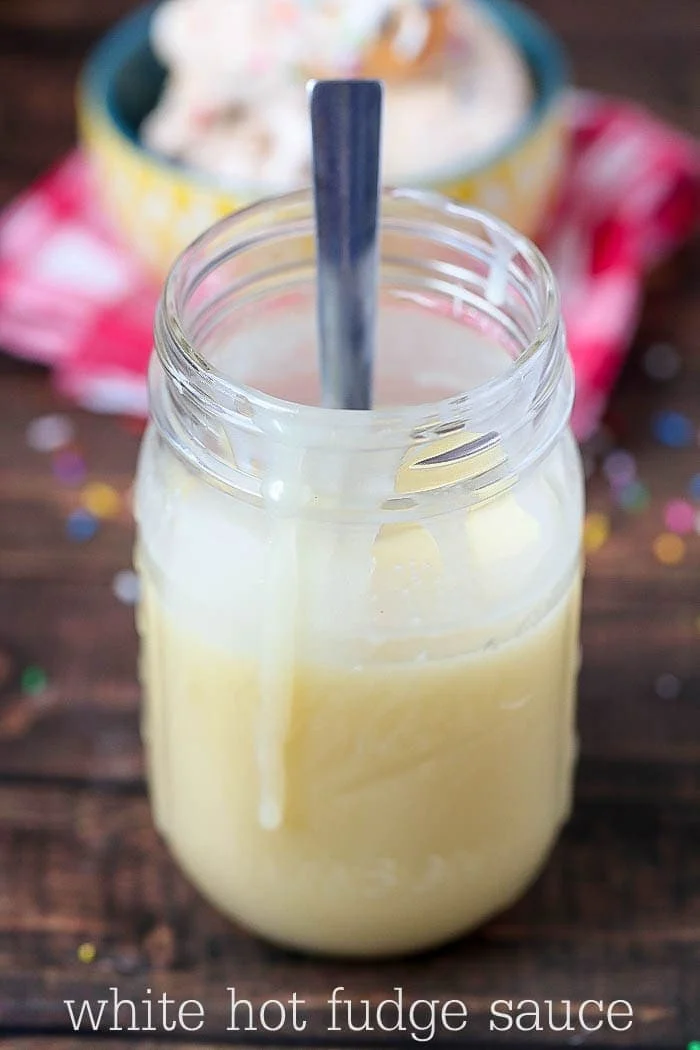 White Chocolate Hot Fudge Sauce in a glass mason jar