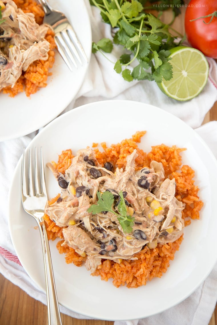 crock pot chicken over spanish rice on plate