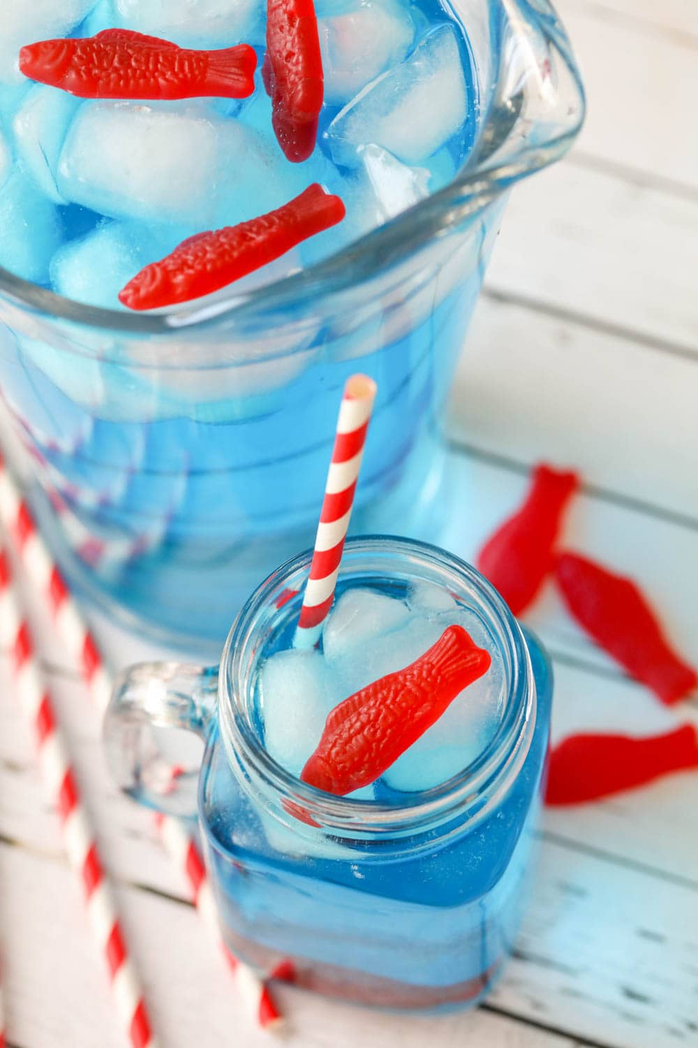 Ocean water served in a glass mason jar with candy fish.