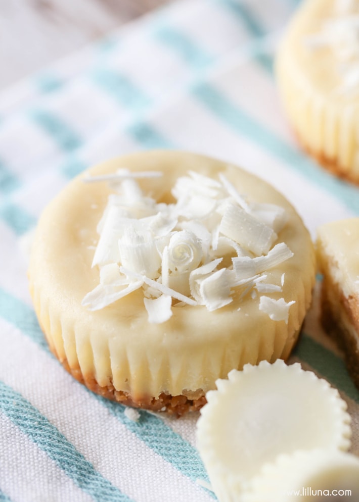 Mini Peanut Butter Cheesecakes on a blue and white cloth