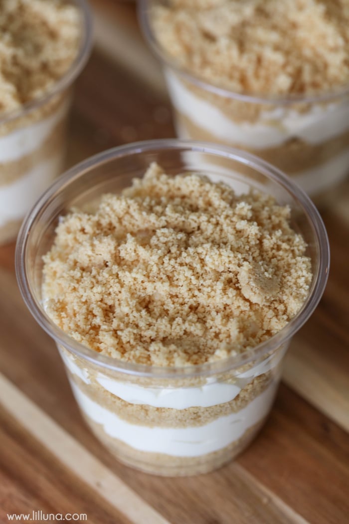 Crumbled Oreo layered with pudding on clear cups