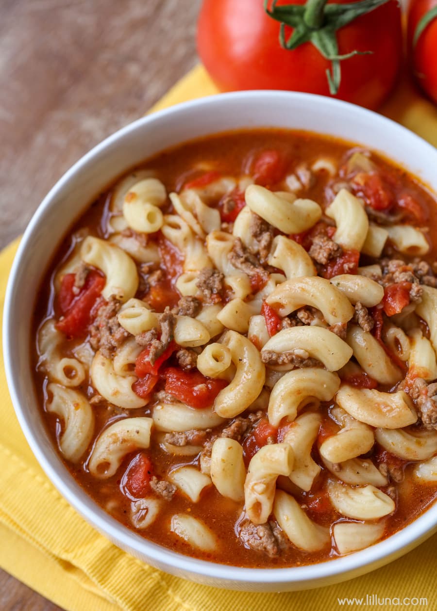 Beef & Tomato Macaroni Soup served in a white bowl