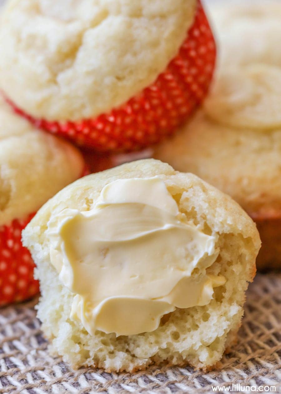 Sweet honey muffins cut and covered with butter