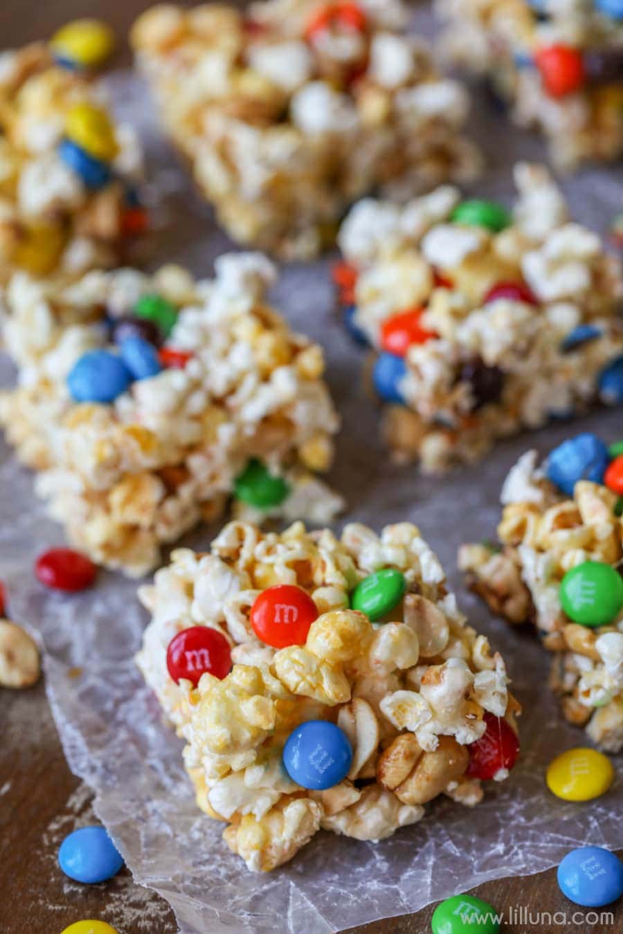 close up of popcorn bars on wax paper