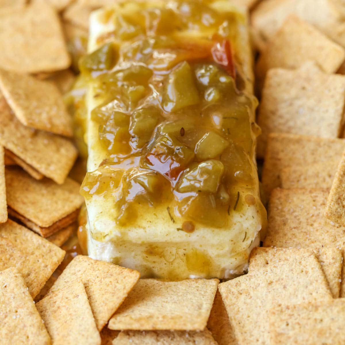Easy Appetizers - Cream Cheese Green Chili Dip surrounded by wheat thin crackers. 