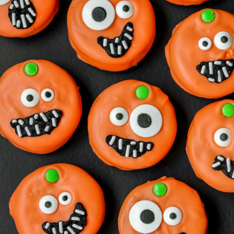 Halloween Oreo cookies decorated as pumpkins.