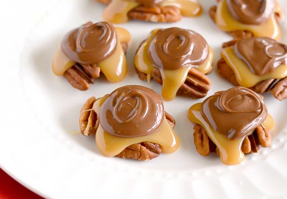 Chocolate turtles on a white plate