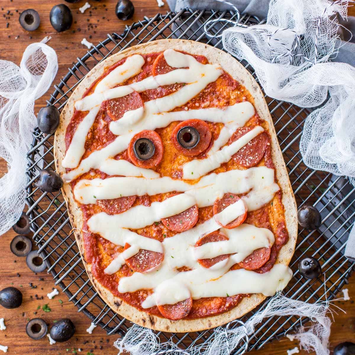 Halloween Flatbread pizza shaped like a mummy