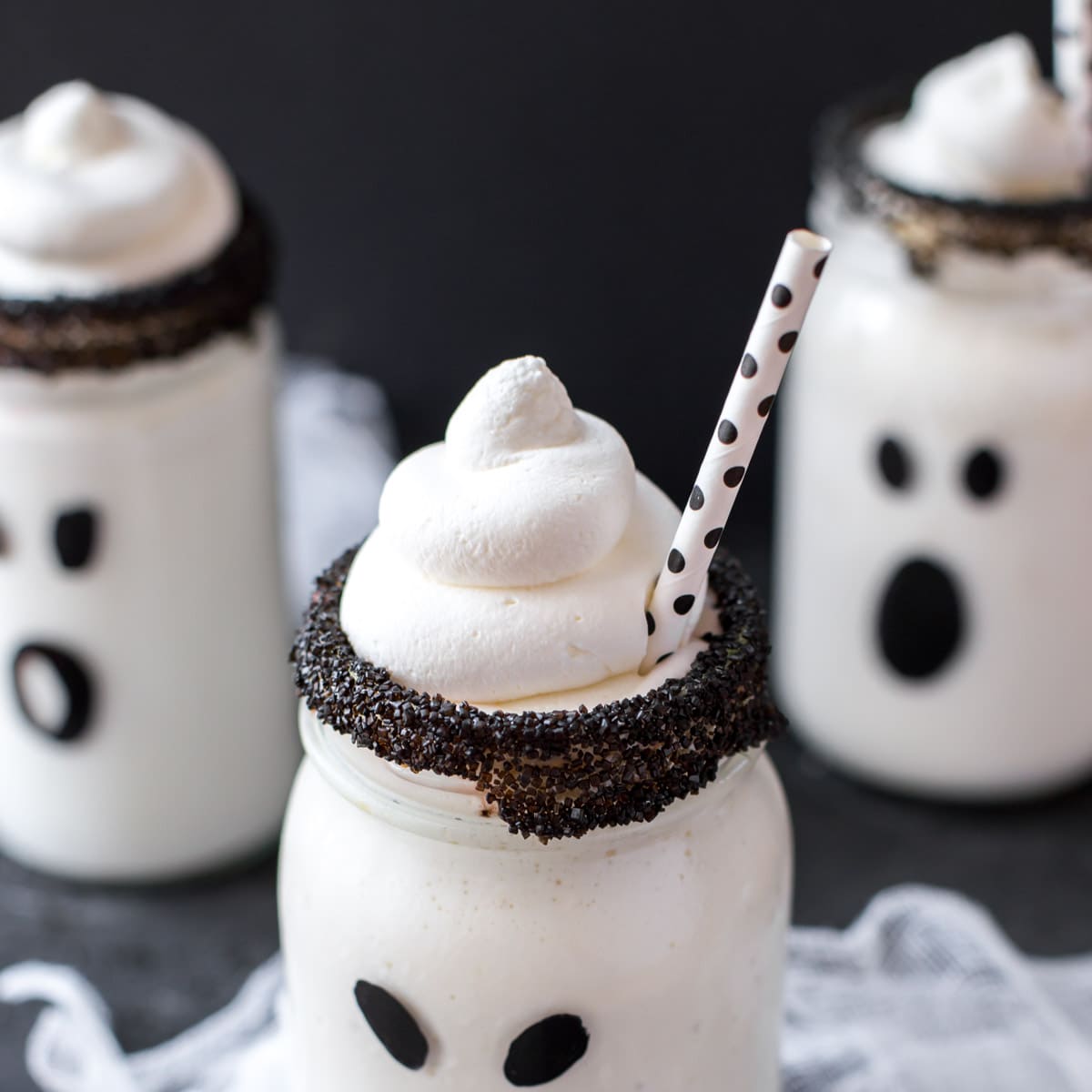 Boo-nilla milkshakes with whipped cream on top
