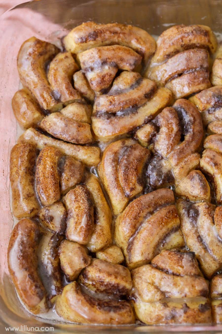 Pumpkin Cinnamon Roll Bites covered in glaze