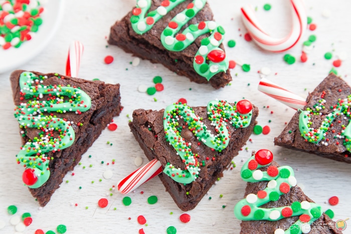 Decorated Christmas tree brownies decorated with green frosting.