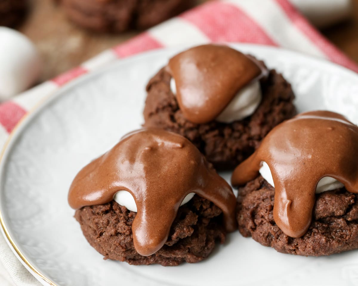 Easy cookie recipes - chocolate marshmallow cookies, 3 to a plate.