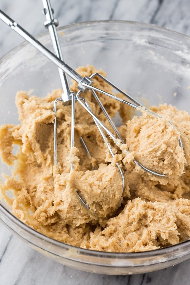 Peanut butter cookie bar dough in a mixing bowl