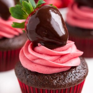 chocolate covered strawberry cupcake on white plate