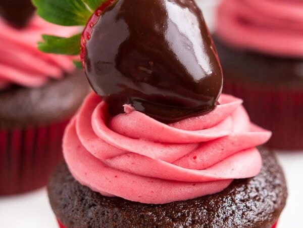 chocolate covered strawberry cupcake on white plate