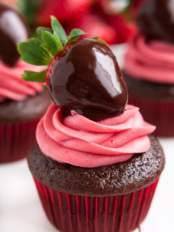 chocolate covered strawberry cupcake on white plate
