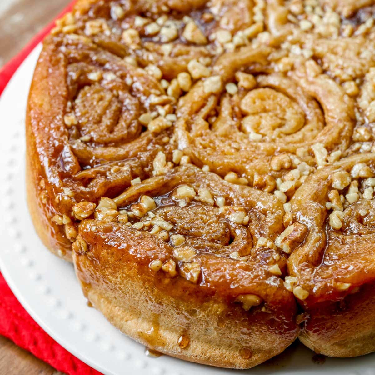 Sticky walnut buns on a white plate