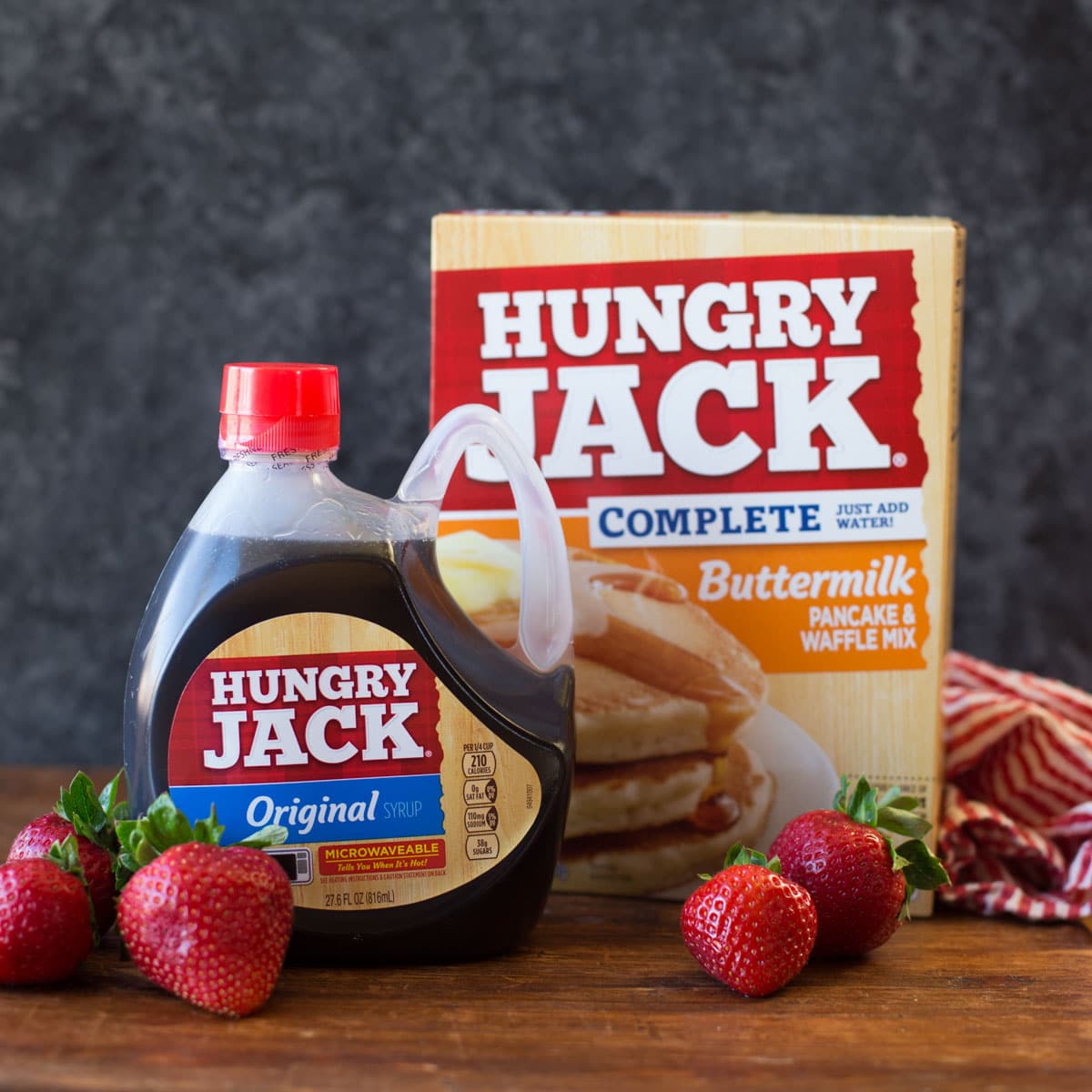 Hungry Jack pancake mix and syrup used to make white chocolate berry pancakes.