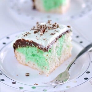 Grasshopper Fudge Cake that starts with a cake mix. The fudge topping and mint cream make this cake unbelievably delicious!