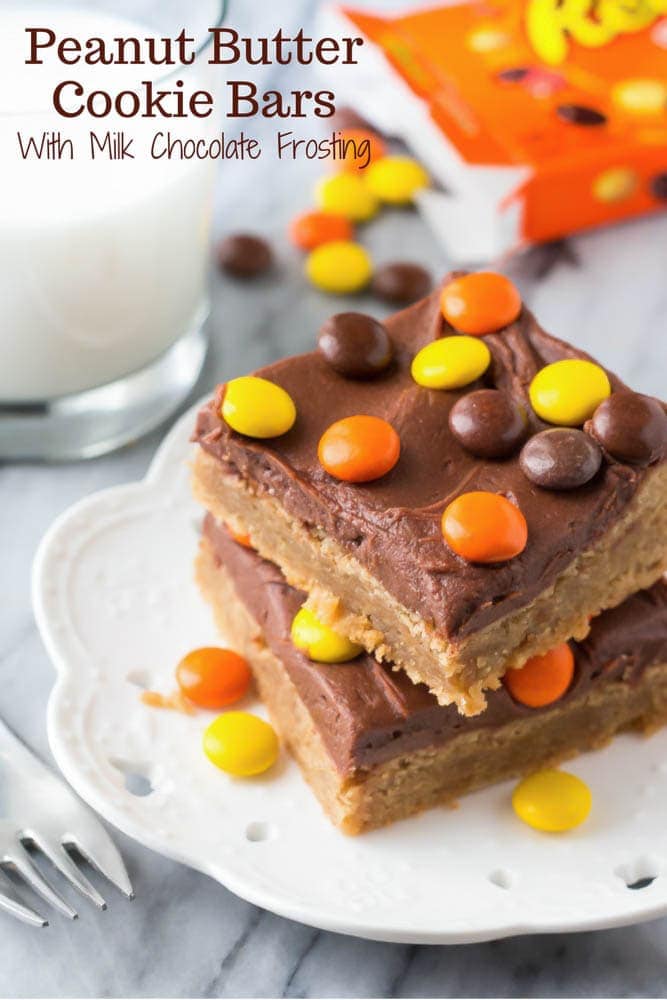 Peanut Butter Cookie Bars stacked on a white plate