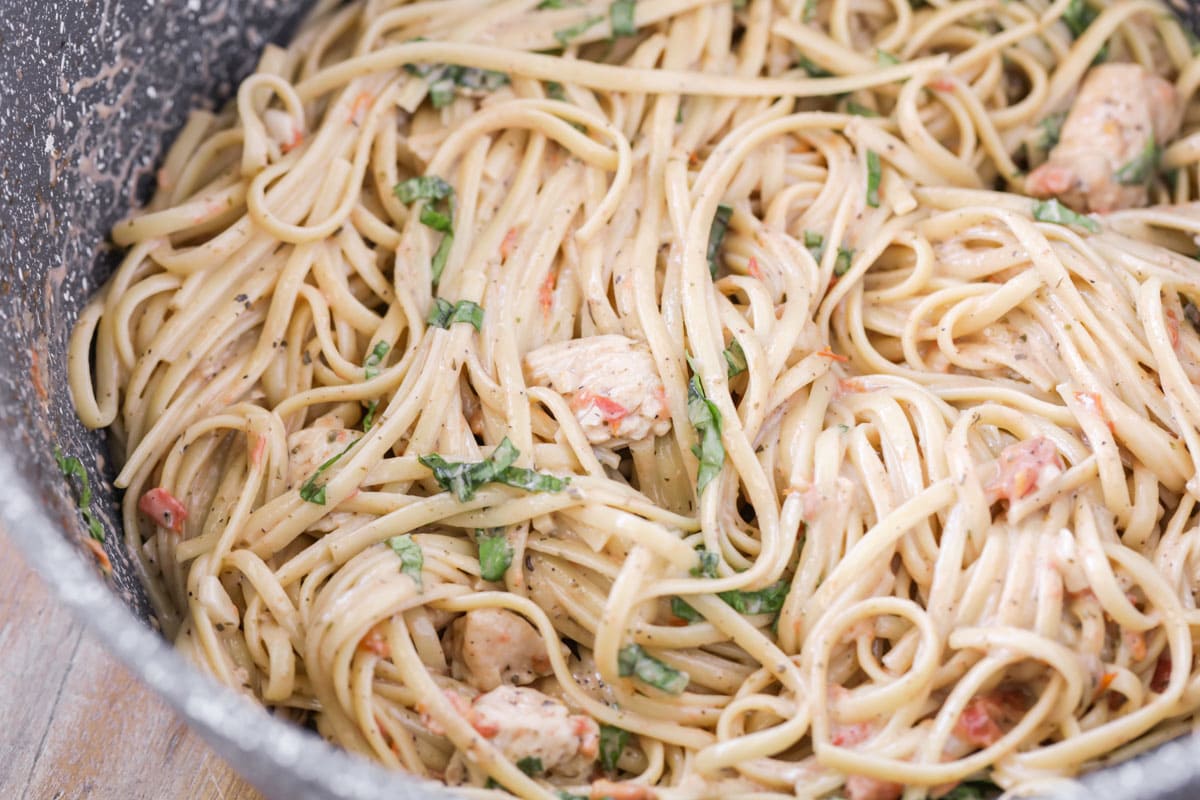 Close up of Bruschetta Chicken Pasta recipe in a pot