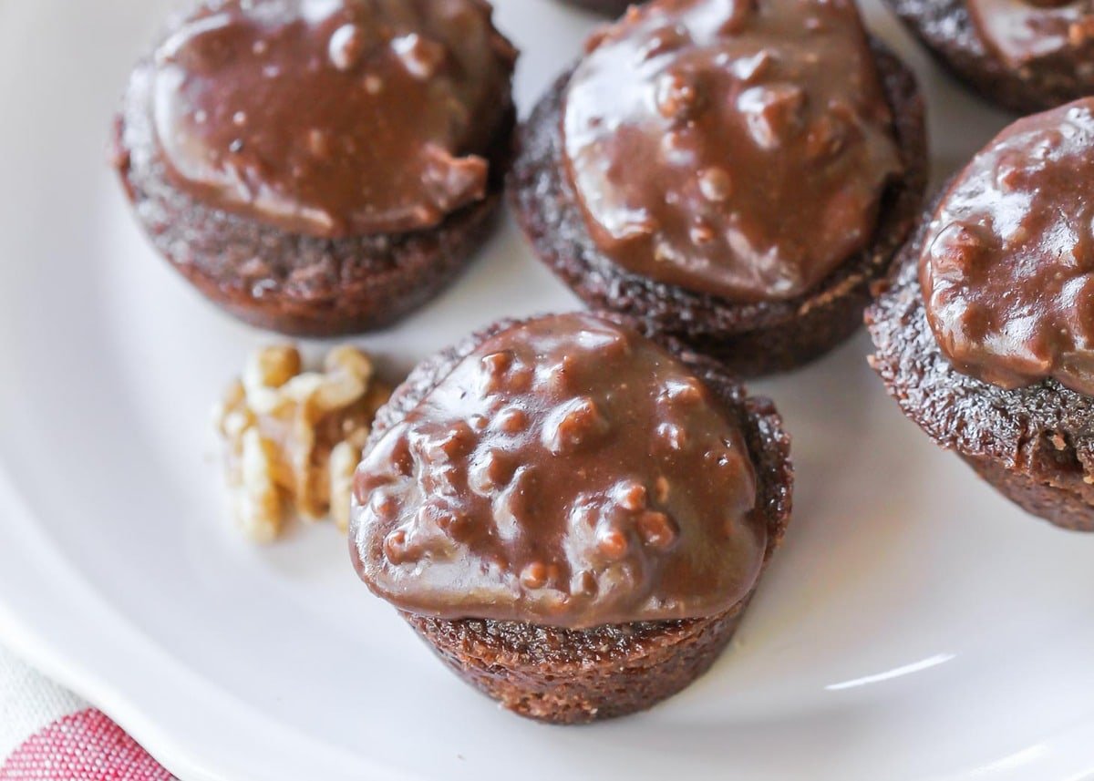 Mini Texas sheet cake cupcakes on a white plate