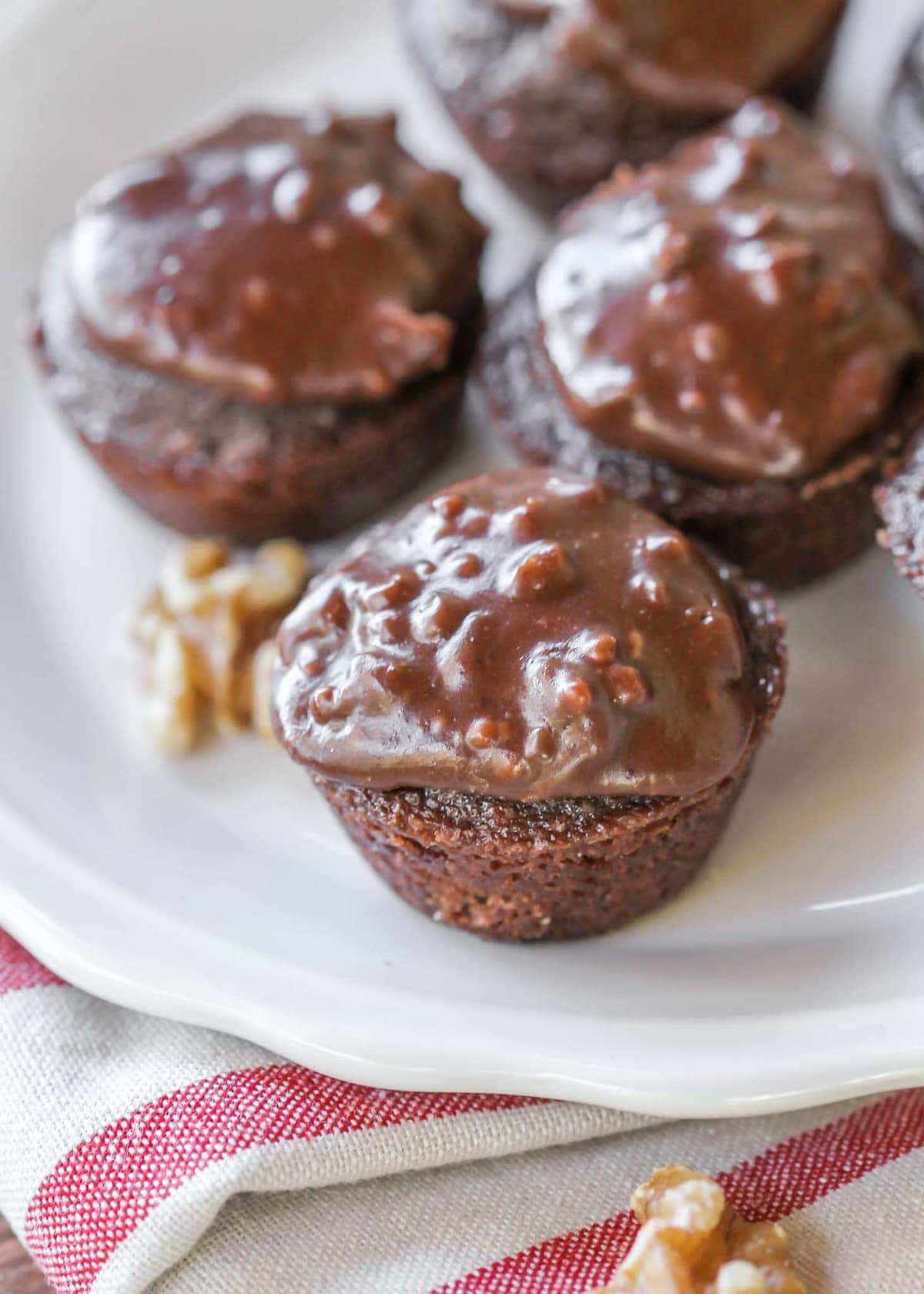 chocolate sheet cake bites on a white plate