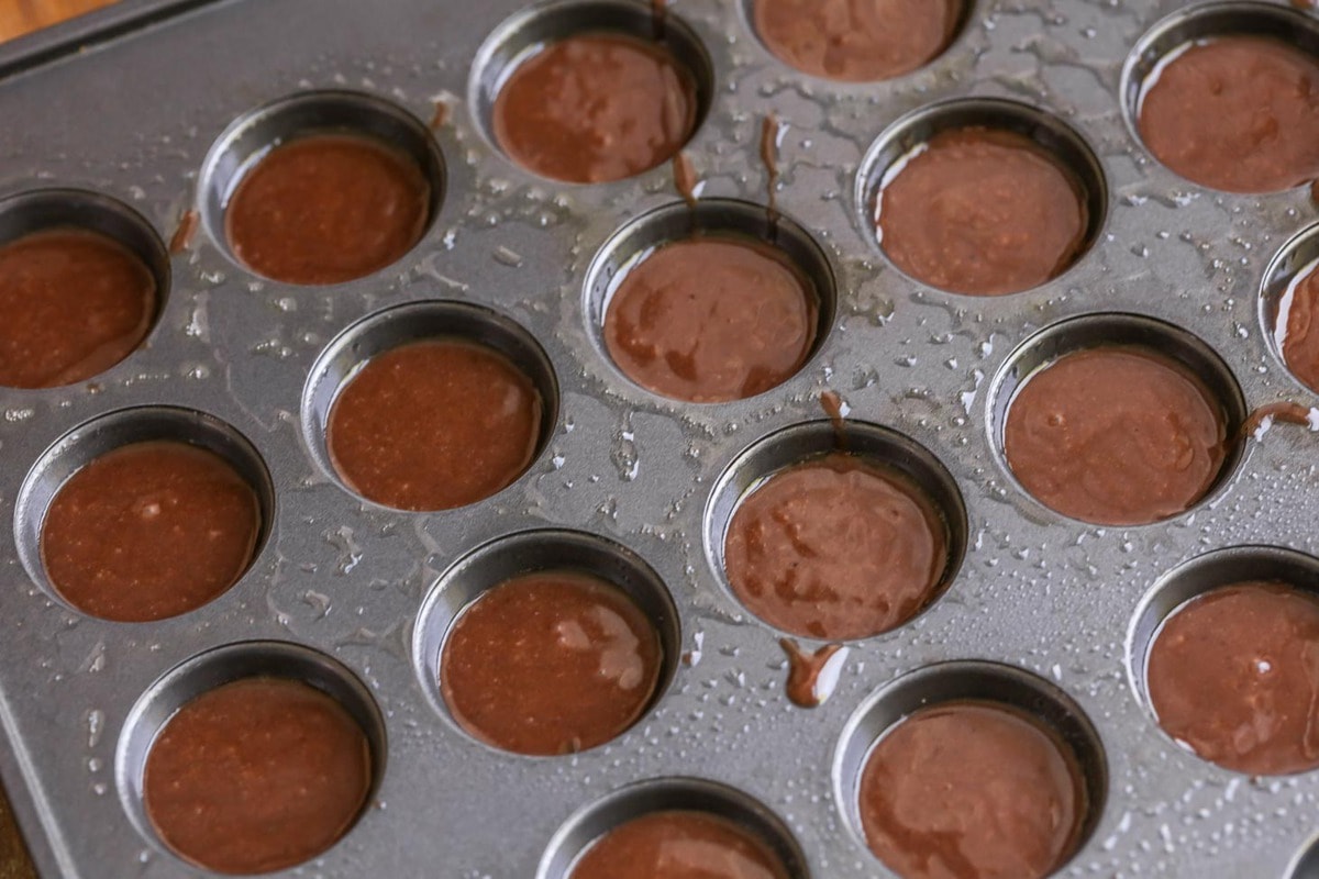 cake bite batter in muffin tin