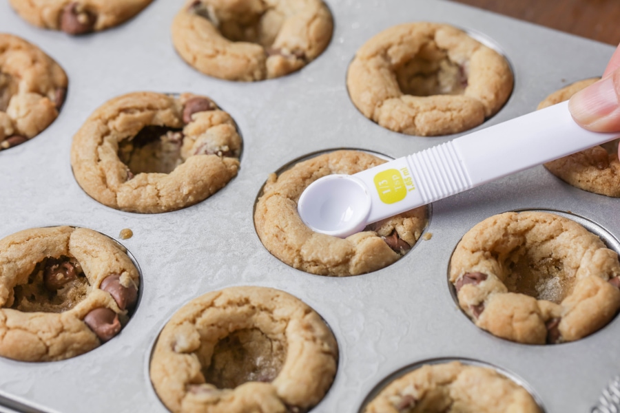 baked cookie dough pressed in a mini muffin tin