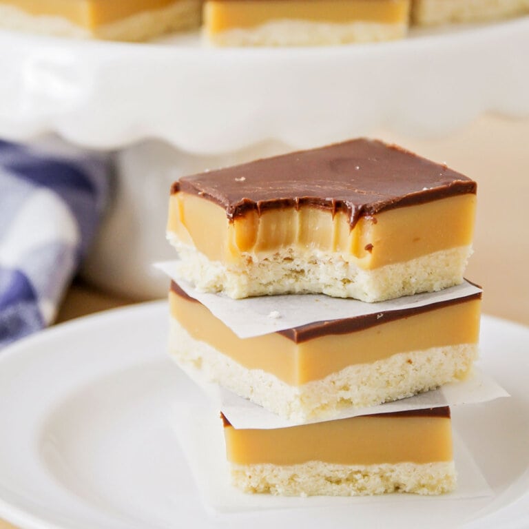 Stack of 3 millionaire bars on a white plate.