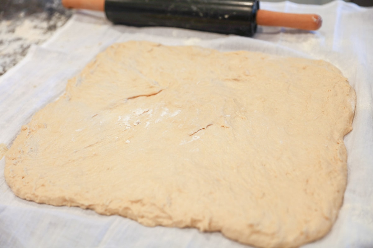 Cinnamon roll dough rolled out