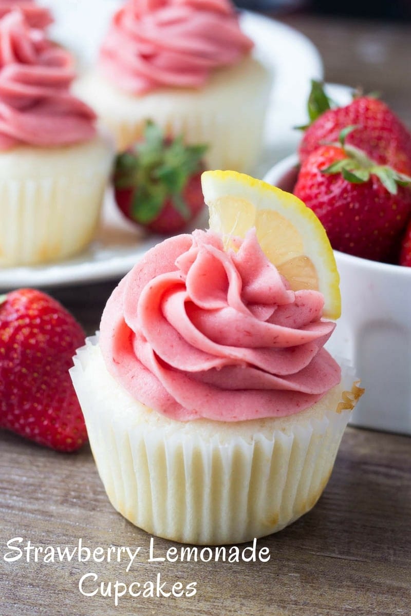 These Strawberry Lemonade Cupcakes garnished with a lemon slice