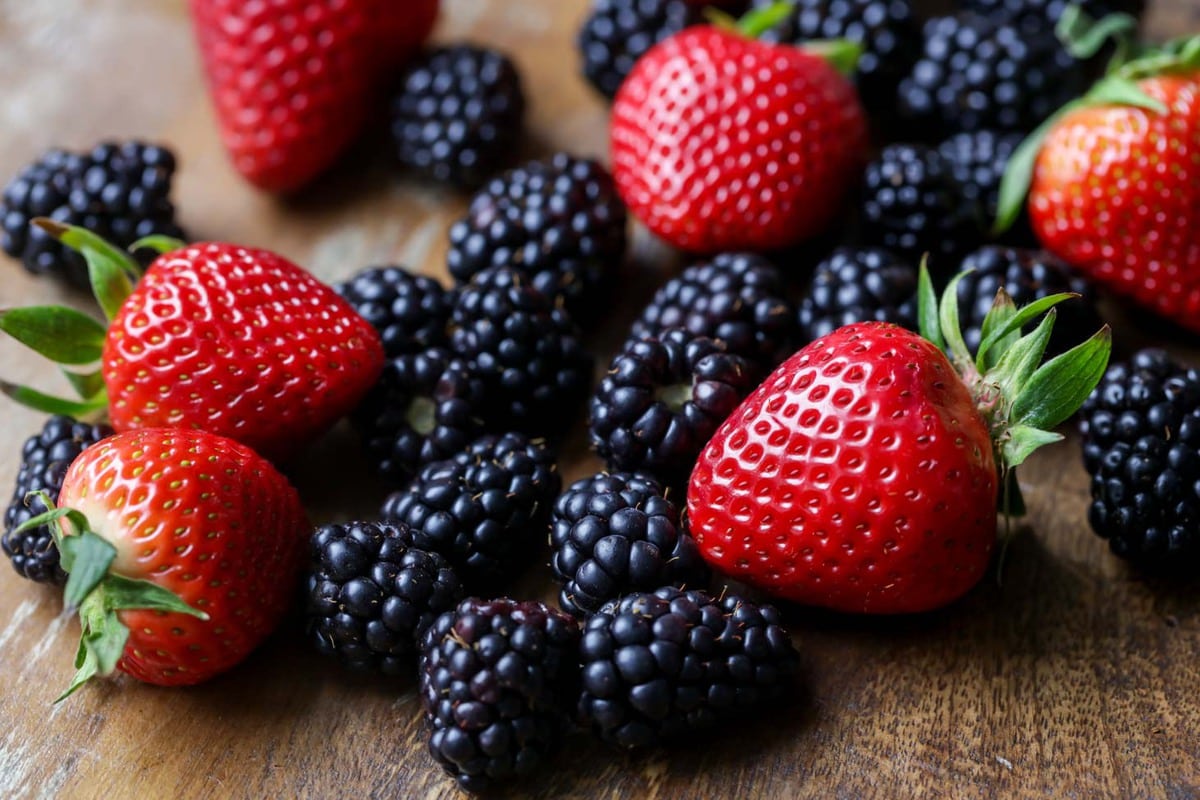 Fresh berries for cheesecake fruit salad washed and prepped.