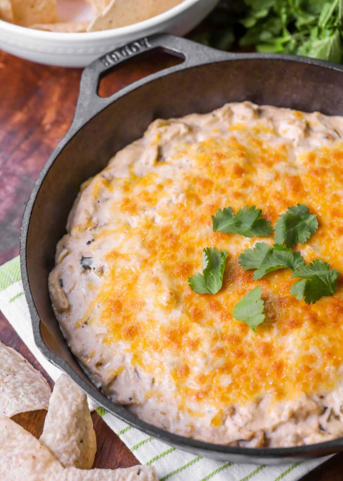 Chicken enchilada dip recipe in cast-iron skillet