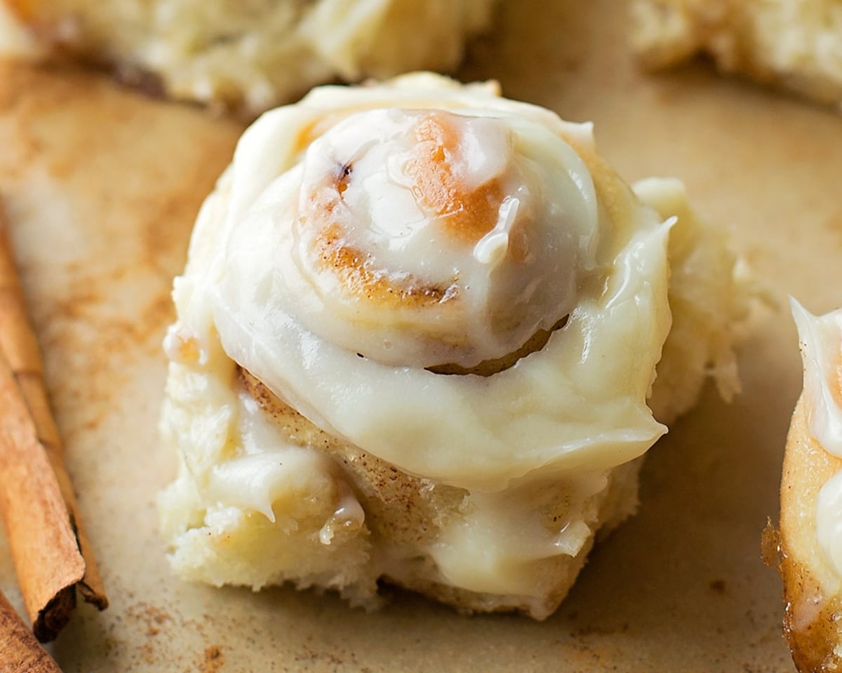 Thanksgiving desserts - a close up of a gooey mini cinnamon rolls.
