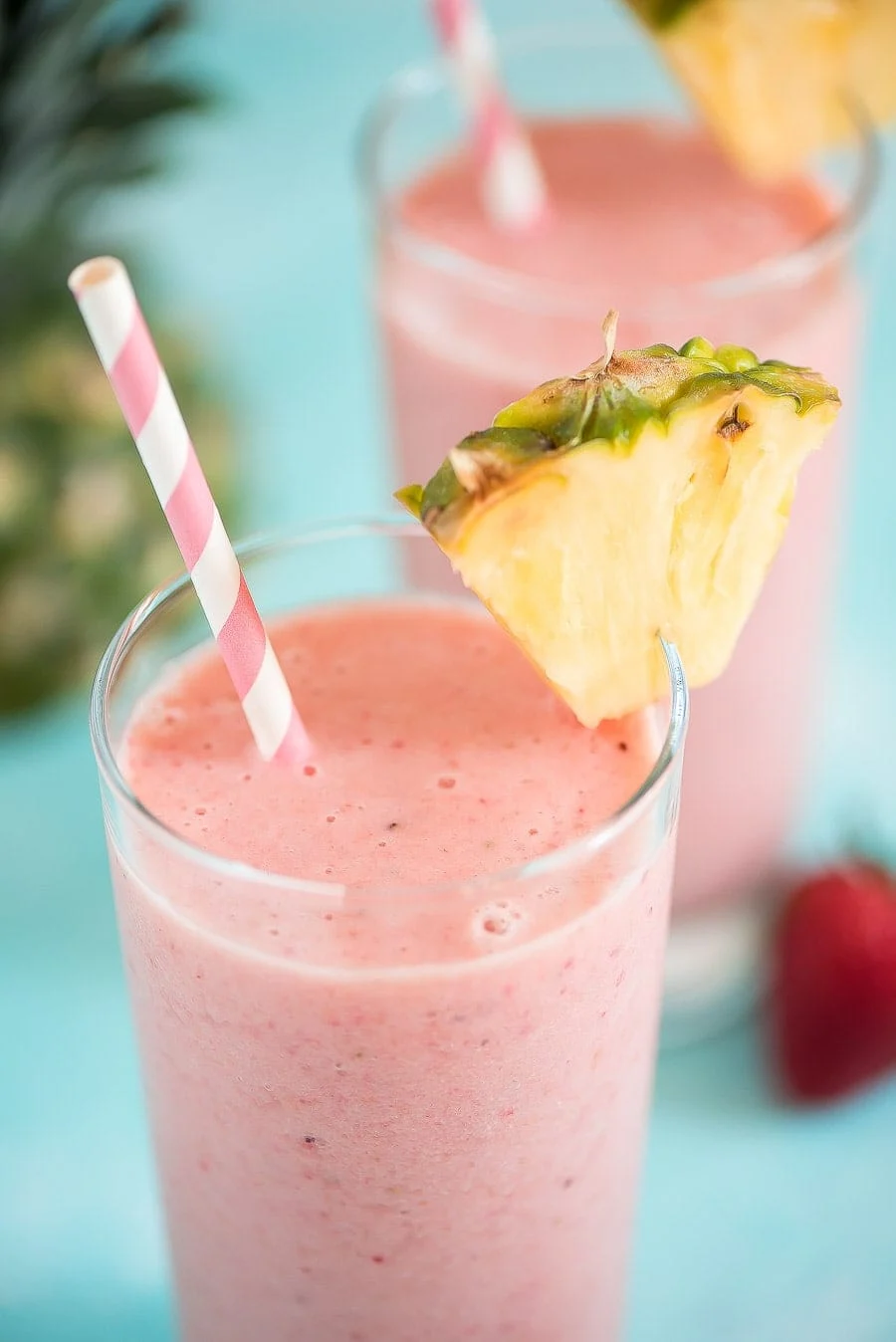 close up of aloha tropical smoothie served with a pink straw