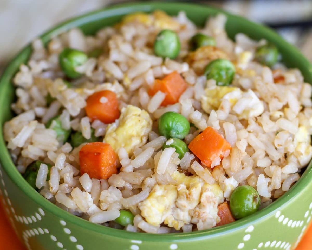 Easy side dishes - homemade fried rice served in a green bowl.