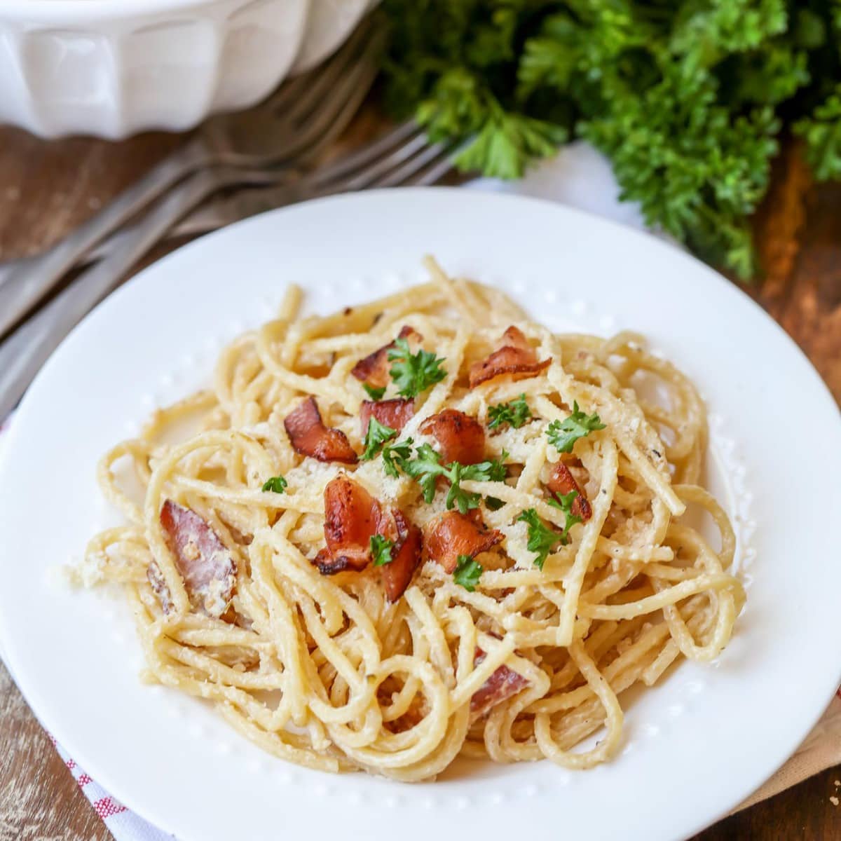 Quick dinner ideas - pasta corbonara topped with bacon.