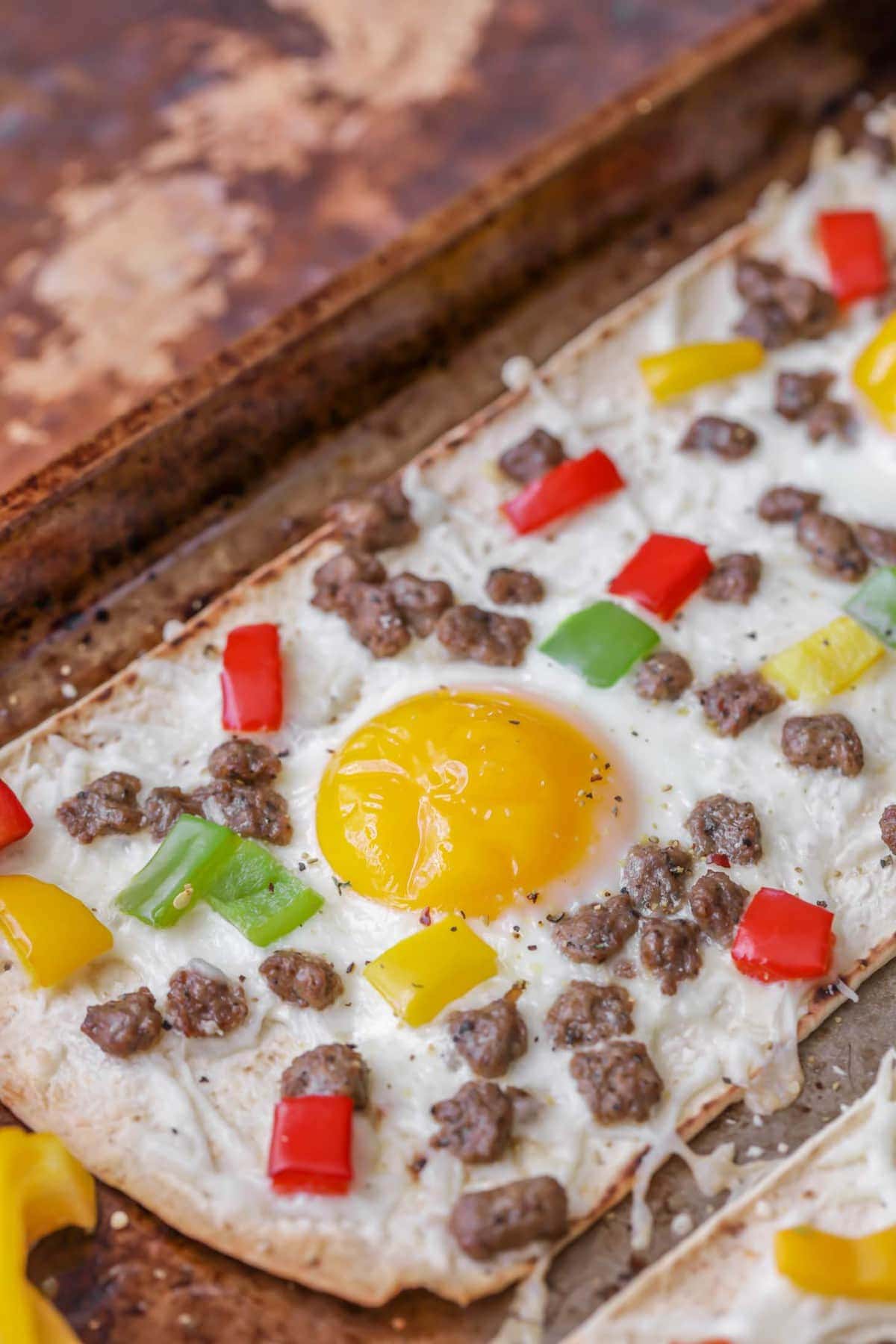 Delicious Healthy Flatbread Breakfast Pizzas on a cookie sheet