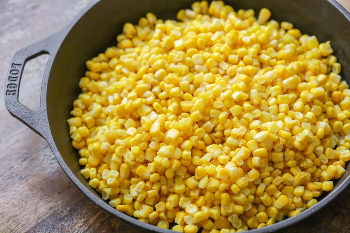 Thawed corn in cast iron skillet.